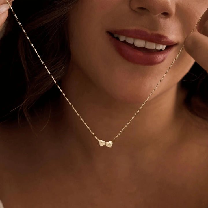 Heart pendant with engraved letter in gold