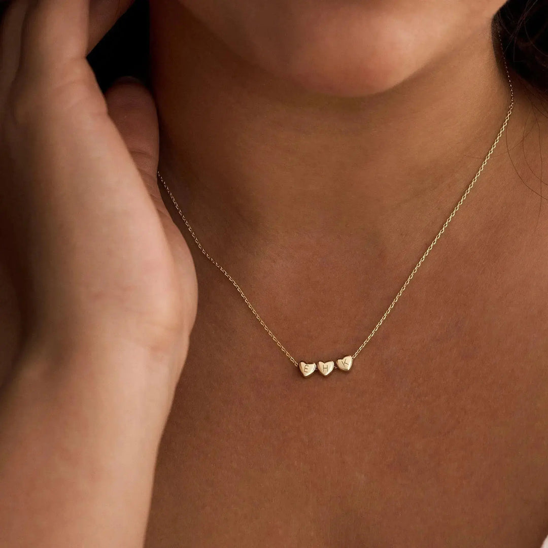 Sterling silver heart initial necklace close-up