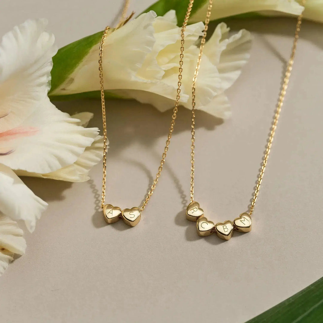 Heart necklace with engraved letters detail