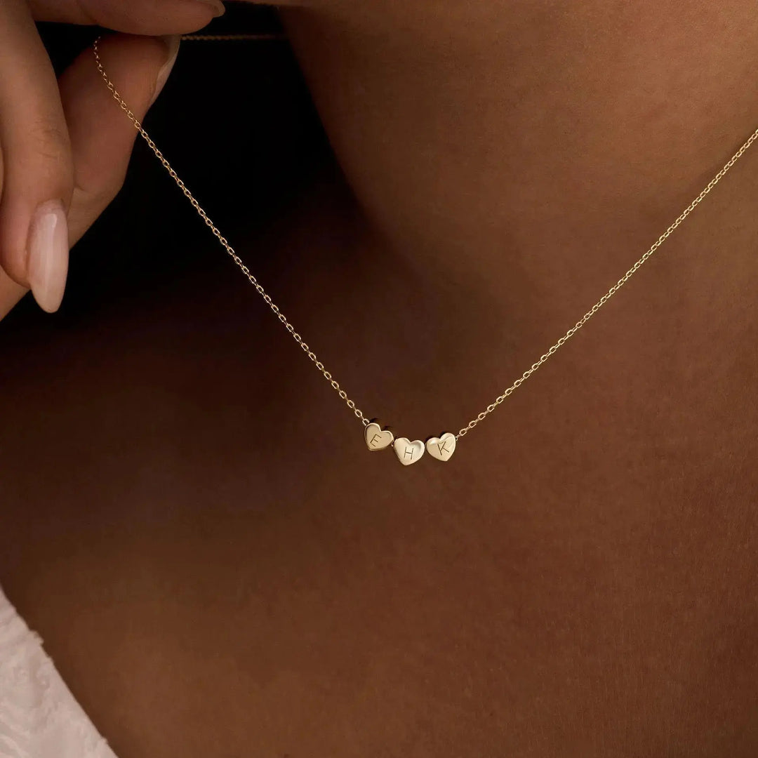 Heart initial necklace styled with a casual outfit