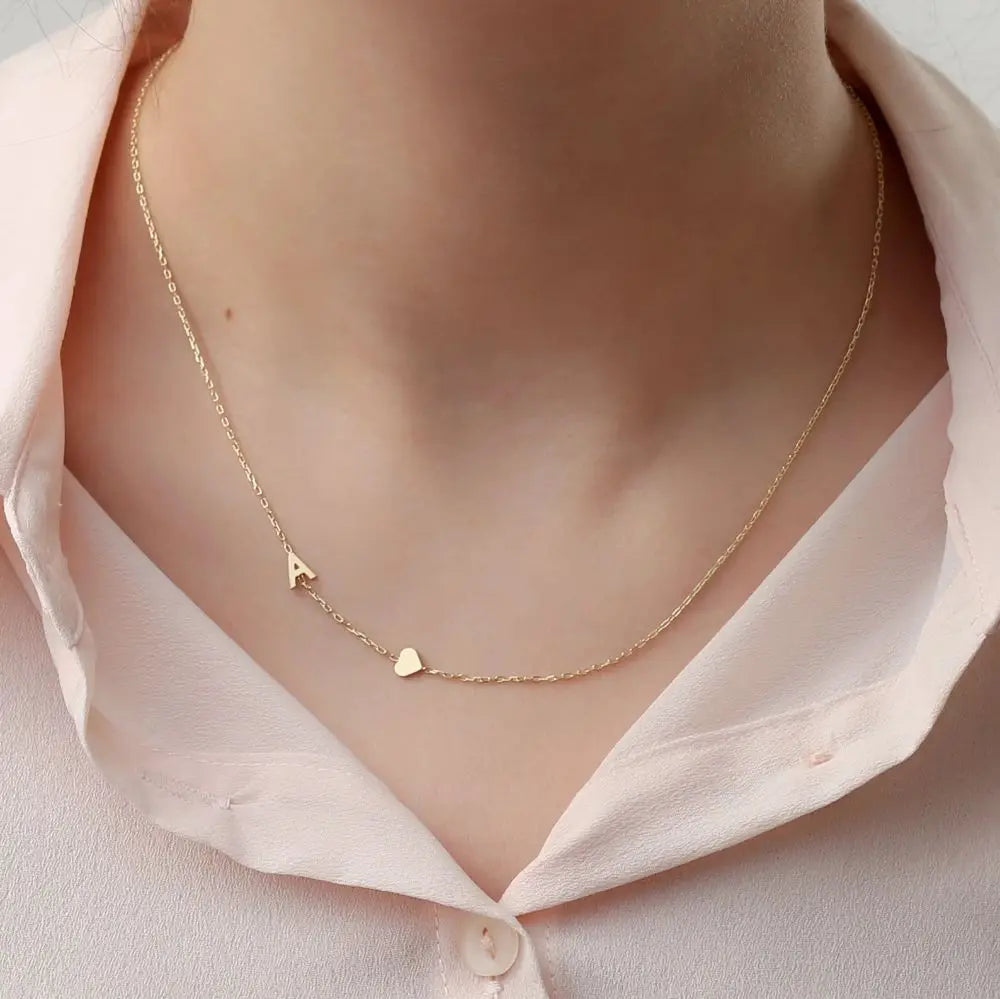 Custom sideways initial necklace in gold-plated stainless steel