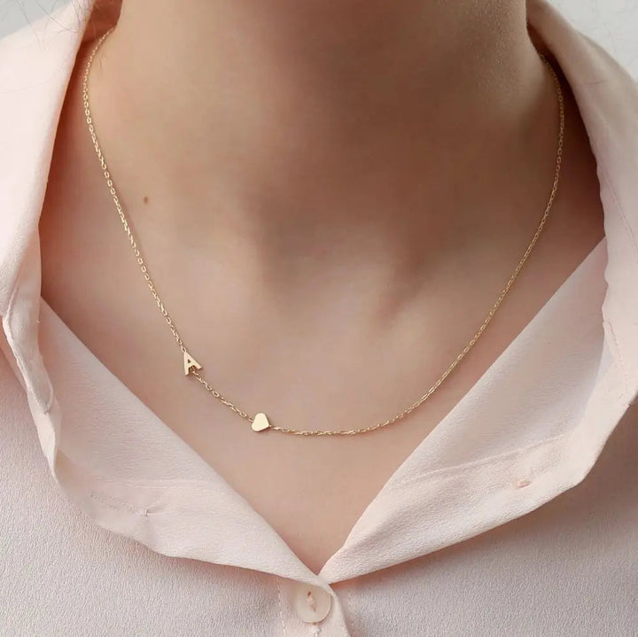 Custom sideways initial necklace in gold-plated stainless steel