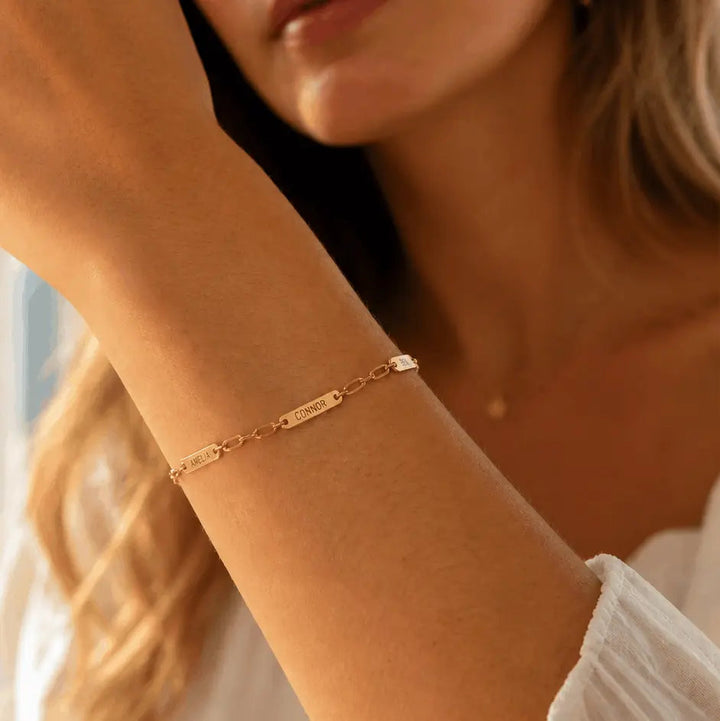 Custom name bar bracelet in gold with four names