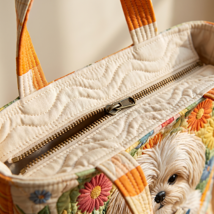 Close-up of quilted stitching and zipper