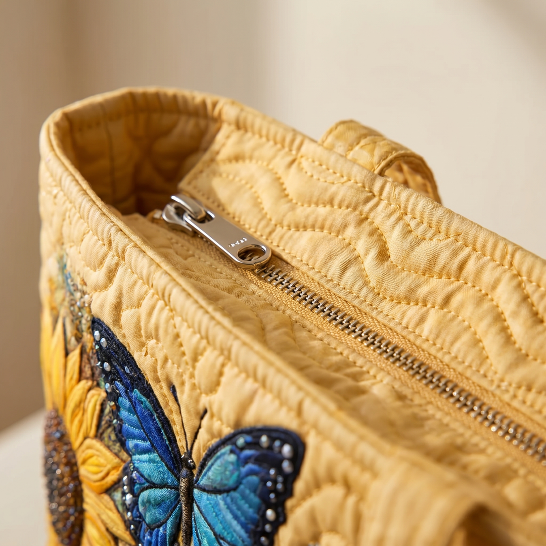 Close-up of quilted stitching and zipper