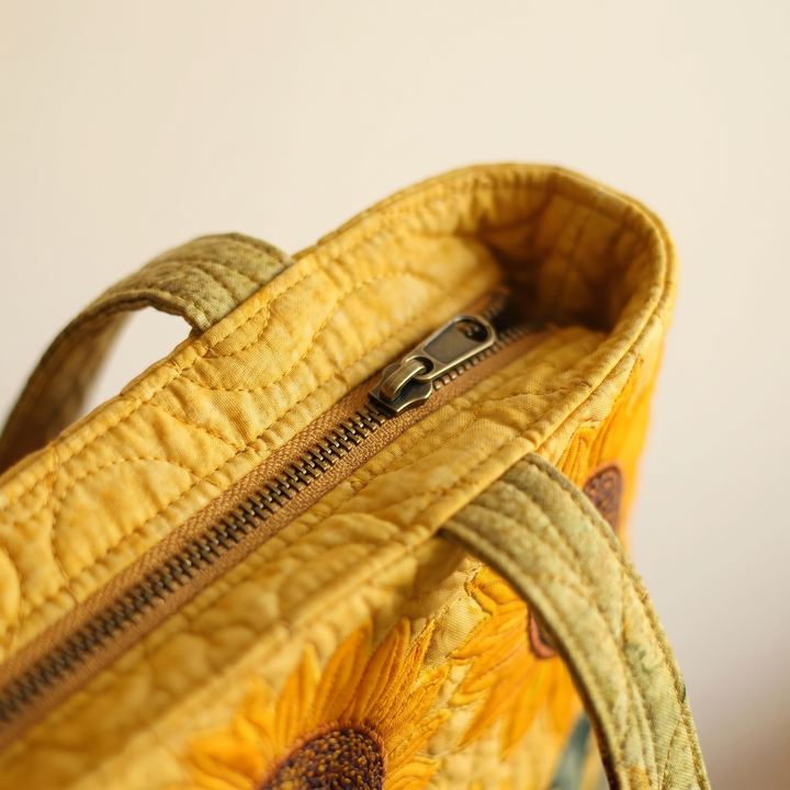 Close-up of quilted stitching and zipper