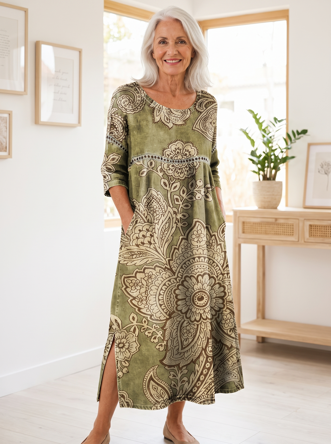 Older woman wearing the Asuncion printed dress, hands in the side pockets