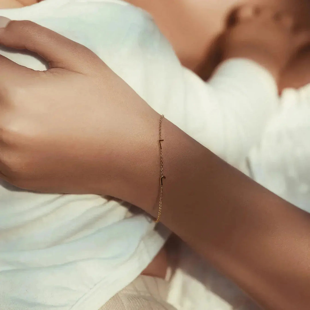 Sideways initial bracelet adjustable chain detail