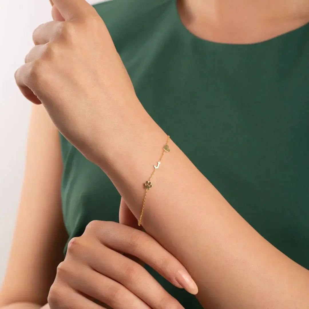 Sideways initial bracelet in sterling silver close-up